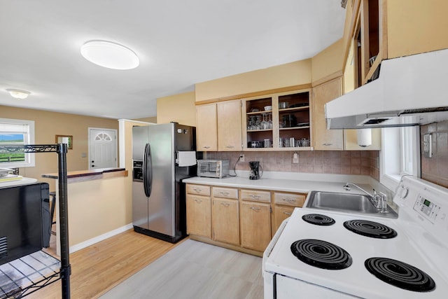 kitchen with stainless steel fridge with ice dispenser, electric range, under cabinet range hood, a sink, and light wood finished floors