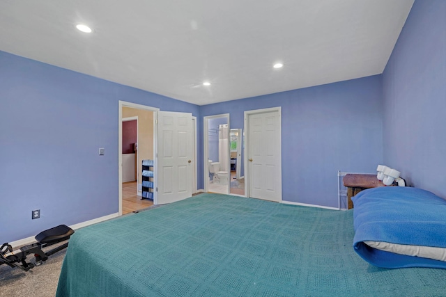 bedroom featuring baseboards, recessed lighting, and light carpet