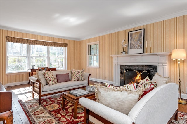 3 Barkers Point Rd, Sands Point, NY 11050 - living area with hardwood / wood-style floors, a high end fireplace, baseboards, and crown molding