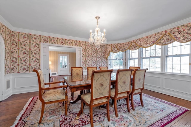3 Barkers Point Rd, Sands Point, NY 11050 - dining space featuring wallpapered walls, a chandelier, hardwood / wood-style floors, a wainscoted wall, and ornamental molding