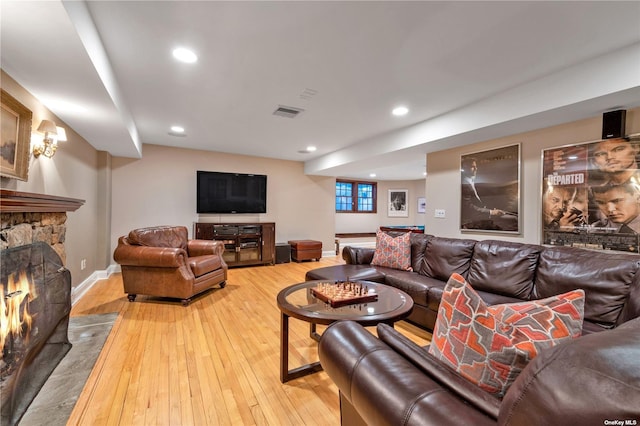 3 Barkers Point Rd, Sands Point, NY 11050 - living area with a fireplace, light wood-style flooring, recessed lighting, and baseboards