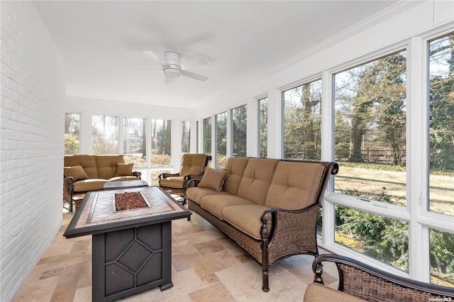 3 Barkers Point Rd, Sands Point, NY 11050 - sunroom / solarium featuring healthy amount of natural light, stone finish floors, and ornamental molding