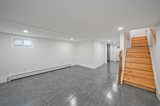 11827 219th St, Cambria Heights, NY 11411 - below grade area featuring a baseboard heating unit, recessed lighting, stairs, and baseboards