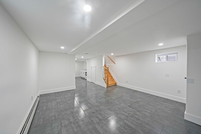 11827 219th St, Cambria Heights, NY 11411 - basement featuring a baseboard radiator, stairs, recessed lighting, and baseboards