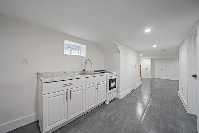 11827 219th St, Cambria Heights, NY 11411 - kitchen featuring white electric stove, a sink, white cabinets, recessed lighting, and light countertops