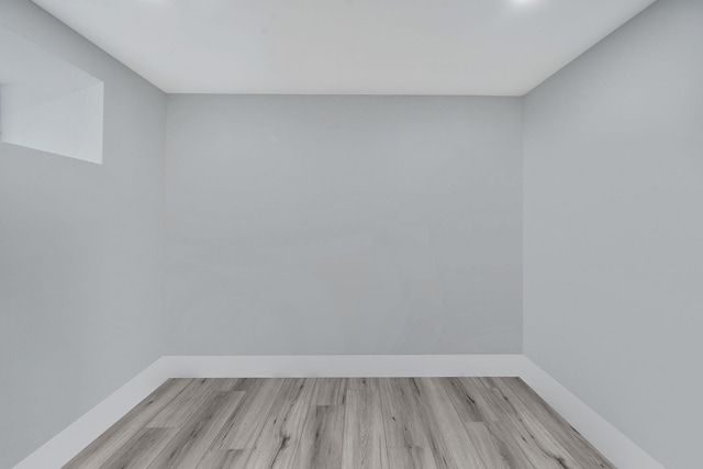 11827 219th St, Cambria Heights, NY 11411 - spare room with wood finished floors and baseboards