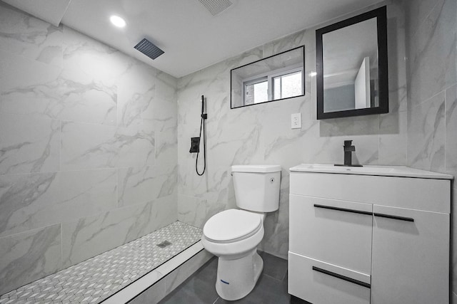 11827 219th St, Cambria Heights, NY 11411 - full bath featuring vanity, toilet, and a marble finish shower