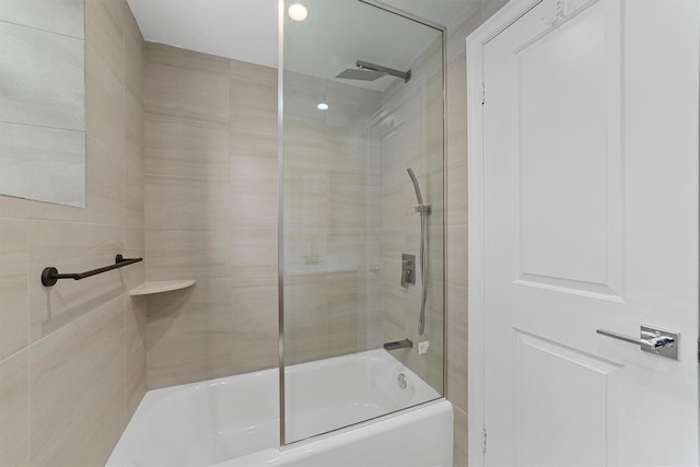 full bath with bath / shower combo with glass door