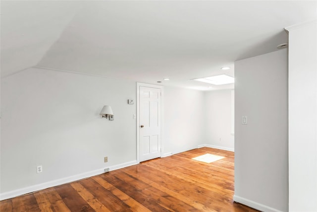 8 Hazel Rd, Port Washington, NY 11050 - empty room with wood-type flooring and recessed lighting