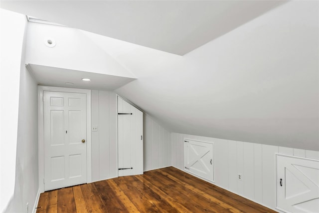 8 Hazel Rd, Port Washington, NY 11050 - bonus room with dark wood-style floors and lofted ceiling