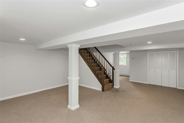 8 Hazel Rd, Port Washington, NY 11050 - basement featuring carpet floors, stairs, recessed lighting, and a baseboard heating unit