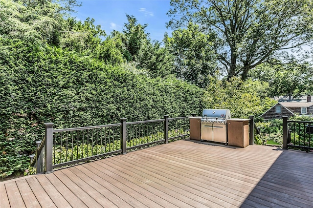 8 Hazel Rd, Port Washington, NY 11050 - wooden terrace with a grill