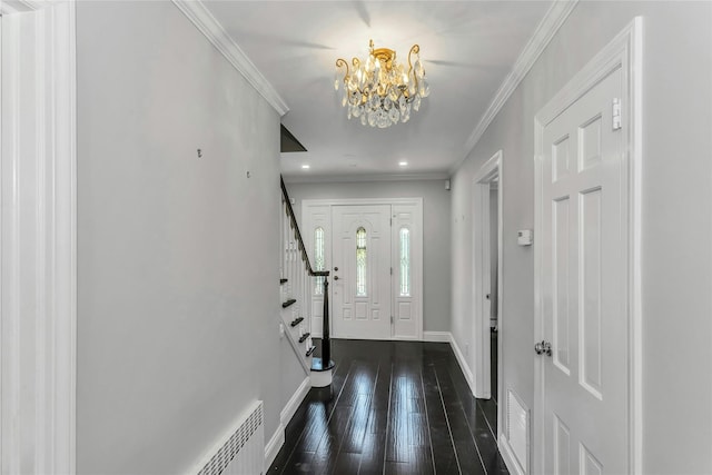 8 Hazel Rd, Port Washington, NY 11050 - entrance foyer featuring a chandelier, crown molding, stairway, dark wood-type flooring, and recessed lighting