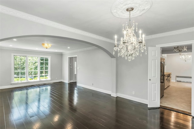 8 Hazel Rd, Port Washington, NY 11050 - unfurnished room with arched walkways, radiator heating unit, a chandelier, dark wood-type flooring, and recessed lighting