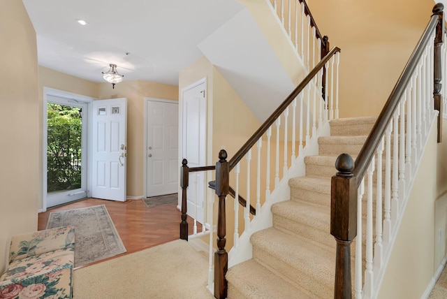 48 Clarewood Dr, Hastings-On-Hudson, NY 10706 - entrance foyer featuring stairway, wood finished floors, recessed lighting, and baseboards