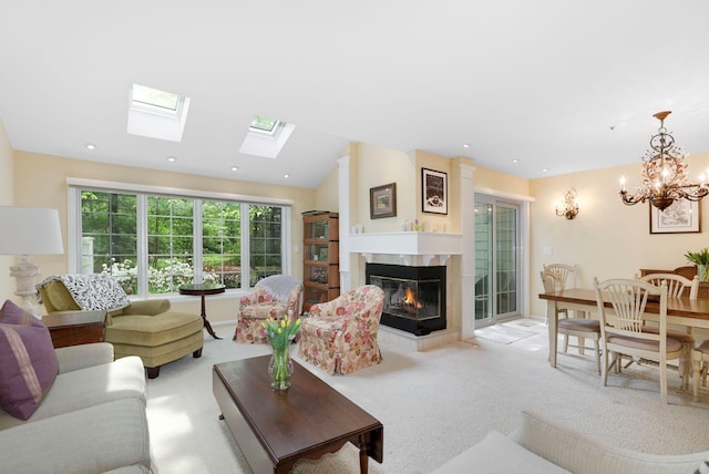 48 Clarewood Dr, Hastings-On-Hudson, NY 10706 - living area with a premium fireplace, light carpet, a skylight, a chandelier, and lofted ceiling