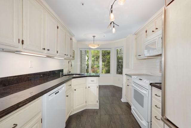 48 Clarewood Dr, Hastings-On-Hudson, NY 10706 - kitchen with white appliances, a sink, white cabinets, pendant lighting, and a peninsula
