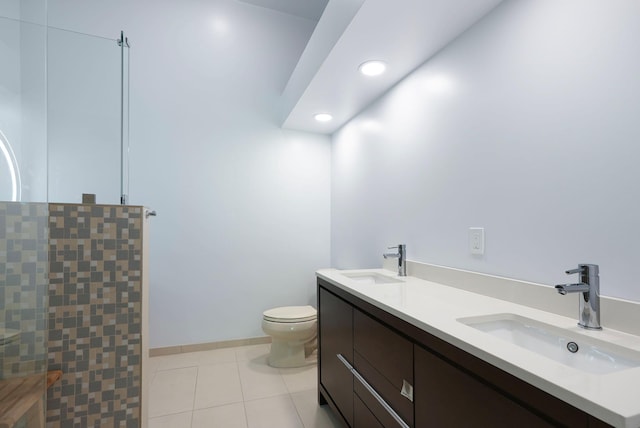 48 Clarewood Dr, Hastings-On-Hudson, NY 10706 - bathroom with toilet, tile patterned floors, a shower, double vanity, and recessed lighting