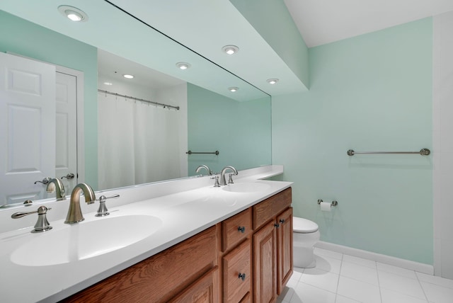 48 Clarewood Dr, Hastings-On-Hudson, NY 10706 - bathroom with toilet, baseboards, tile patterned flooring, recessed lighting, and double vanity