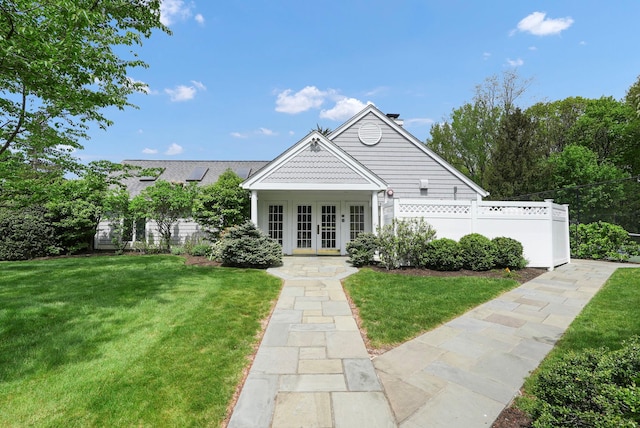 48 Clarewood Dr, Hastings-On-Hudson, NY 10706 - view of front of house with french doors and a chimney