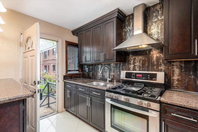 67-15 Bell Blvd Duplex, Unit Duplex, Bayside, NY 11364 - kitchen with stainless steel gas range oven, wall chimney exhaust hood, a sink, decorative backsplash, and light tile patterned flooring
