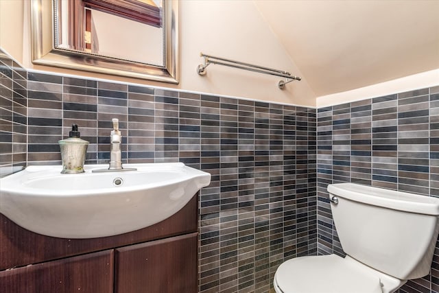 67-15 Bell Blvd Duplex, Unit Duplex, Bayside, NY 11364 - half bathroom with tile walls, toilet, lofted ceiling, and vanity