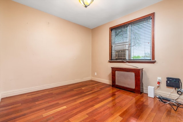 67-15 Bell Blvd Duplex, Unit Duplex, Bayside, NY 11364 - spare room with wood finished floors and baseboards