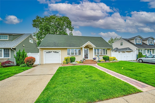 86 Vincent Rd, Hicksville, NY 11801 - view of front of home with driveway, an attached garage, and a shingled roof