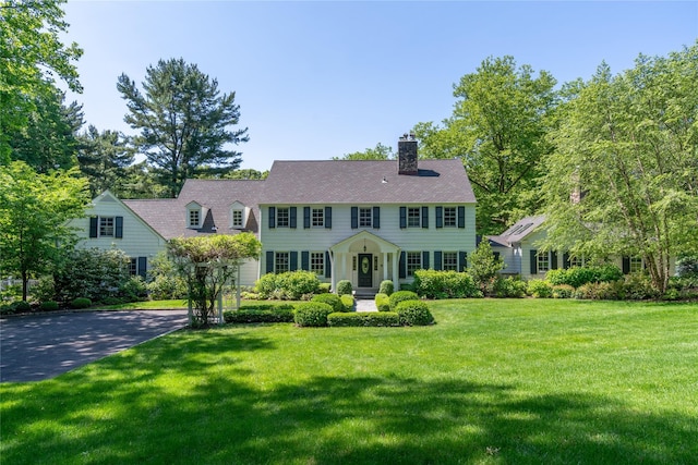 1850 Muttontown Rd, Muttontown, NY 11791 - colonial house with a chimney and a front yard