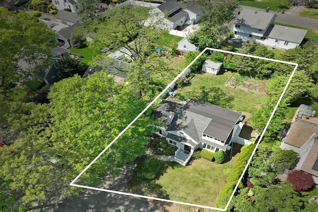 aerial view of residential area featuring property parcel outlined