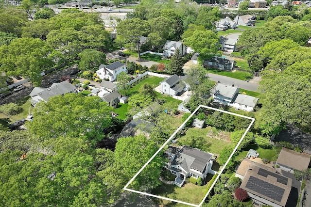 aerial view of residential area with property boundaries highlighted