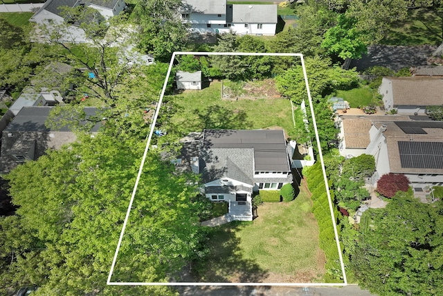 aerial view of residential area featuring property parcel outlined