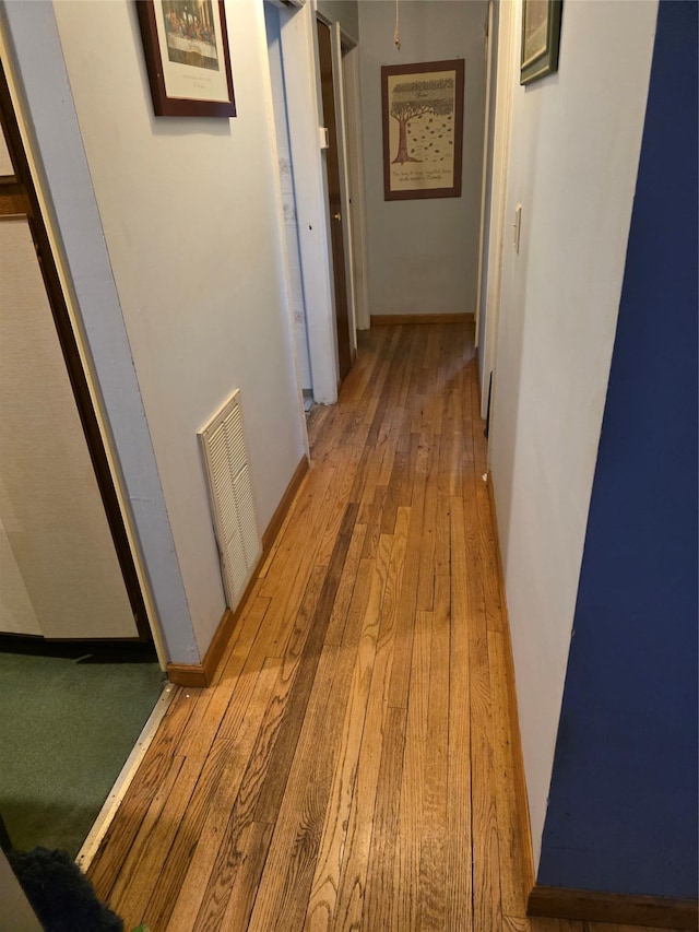 78 Brentwood St, Bay Shore, NY 11706 - corridor with light wood finished floors and baseboards