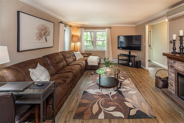 50 Louisiana Ave Unit 9R, Bronxville, NY 10708 - living room featuring wood finished floors, an AC wall unit, crown molding, baseboards, and a fireplace
