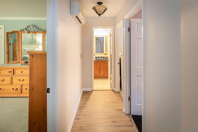 50 Louisiana Ave Unit 9R, Bronxville, NY 10708 - corridor with an AC wall unit, baseboards, and light wood-style floors