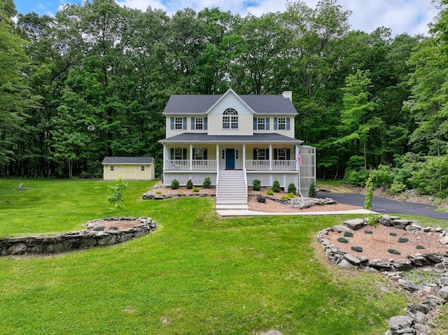 293 S Centerville Rd, Middletown, NY 10940 - colonial-style house featuring a porch, a chimney, a front yard, a wooded view, and stairway