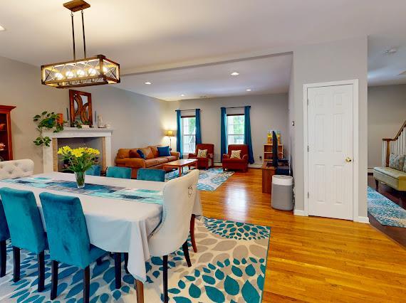 293 S Centerville Rd, Middletown, NY 10940 - dining room with light wood-style floors, stairs, and recessed lighting