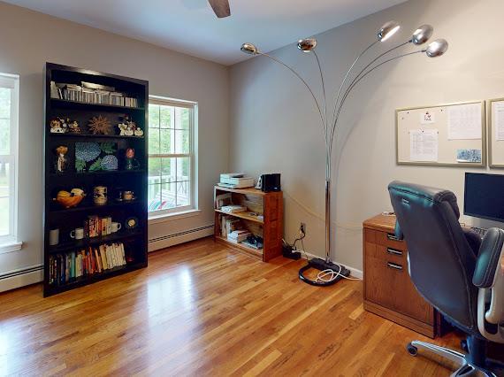 293 S Centerville Rd, Middletown, NY 10940 - office space with a baseboard heating unit, light wood-type flooring, and ceiling fan