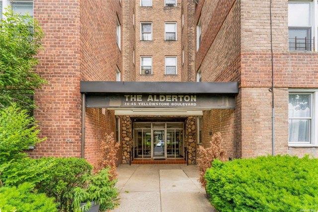 entrance to property with brick siding
