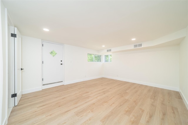 2001 Wellington Ct, Westbury, NY 11590 - spare room featuring light wood finished floors, baseboards, and recessed lighting
