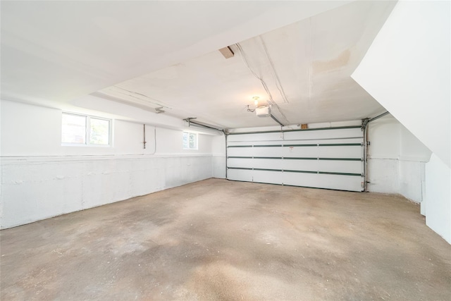 2001 Wellington Ct, Westbury, NY 11590 - garage featuring a garage door opener