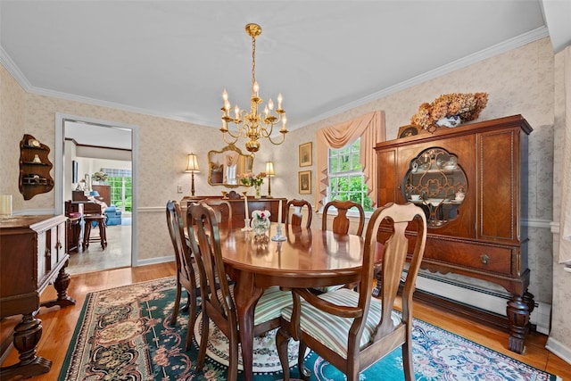 dining area featuring wallpapered walls, a chandelier, wood finished floors, crown molding, and a baseboard radiator