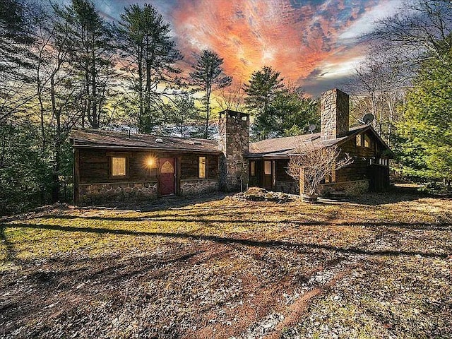 62 Stag Forest Rd, Forestburgh, NY 12777 - view of front of house featuring a chimney and stone siding