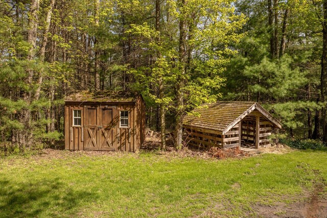 62 Stag Forest Rd, Forestburgh, NY 12777 - view of shed featuring a forest view