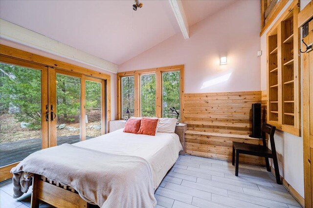 62 Stag Forest Rd, Forestburgh, NY 12777 - bedroom with french doors and light wood-style flooring
