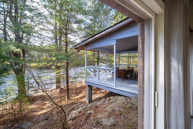 62 Stag Forest Rd, Forestburgh, NY 12777 - wooden deck featuring a sunroom and a water view
