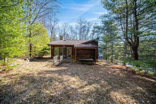 62 Stag Forest Rd, Forestburgh, NY 12777 - back of property featuring a chimney