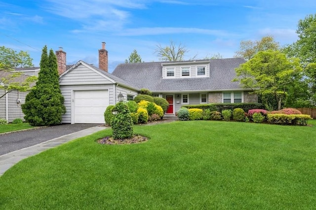 14 Hazel Pl, Woodmere, NY 11598 - view of front of house with a garage, driveway, a front yard, and a chimney