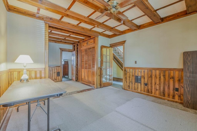 62-12 60th Dr, Maspeth, NY 11378 - misc room with wainscoting, carpet flooring, ceiling fan, and wood walls