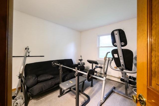 exercise room featuring baseboards